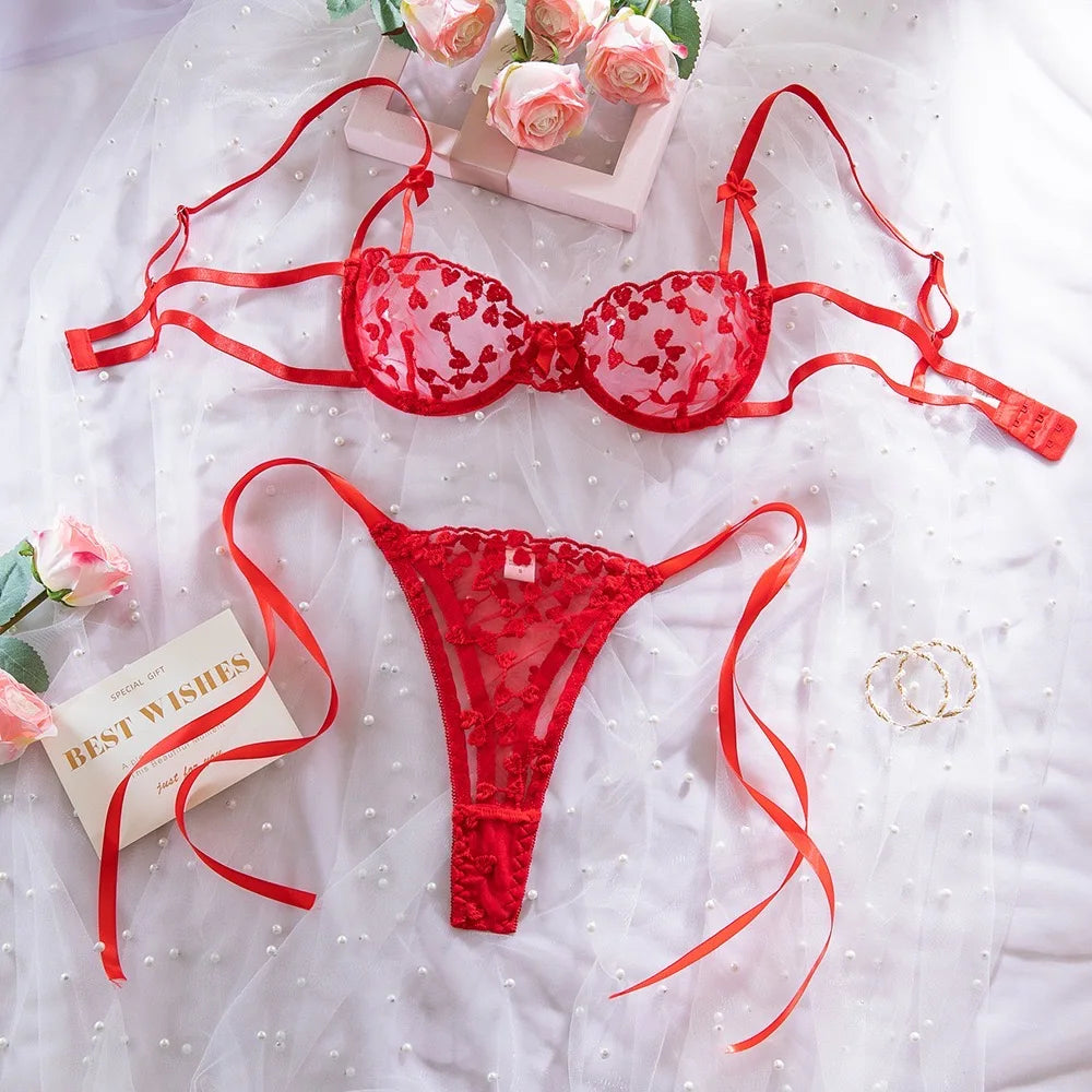 Red embroidered heart-shaped lingerie set with sheer and breathable design, perfect for a date party or any other occasion. It's